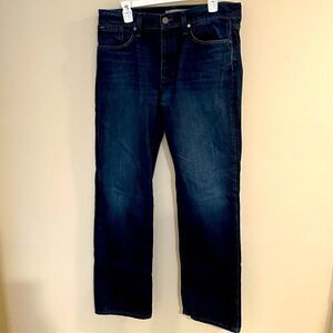 Joe’s Jeans dark wash rebel size 34 distressed hem